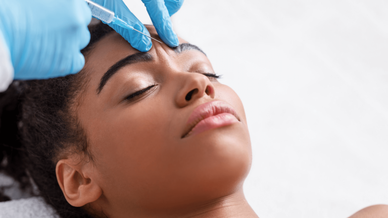 RN nurse injector administering Botox treatment at The Skin Shop Medspa Scottsdale AZ